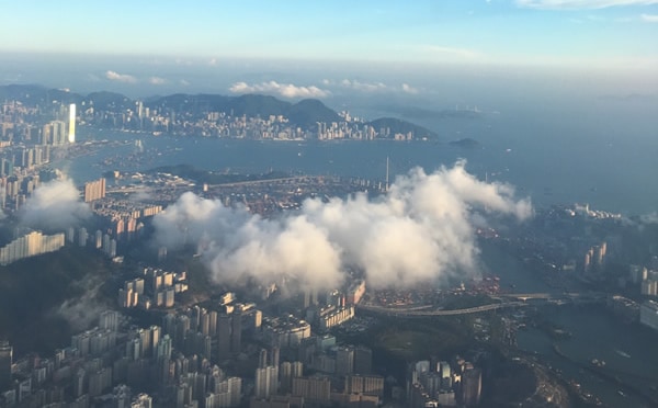 dragon appearing in a cloud over Hong Kong